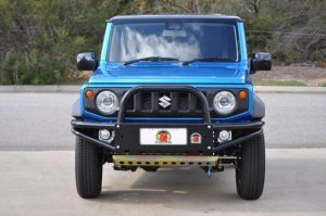 Front view of a blue Suzuki 4WD vehicle featuring a robust off-road bumper, bull bar, and additional protective accessories. This Explore Off Road modified Suzuki showcases the versatility and durability of high-quality 4WD parts, perfect for enthusiasts looking to enhance their vehicle's performance and safety for off-road adventures in Australia.