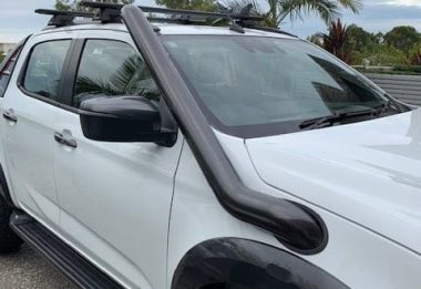 A white SUV with a distinctive snorkel attached to the front, designed for off-road driving. Perfect for enhancing performance in challenging conditions.